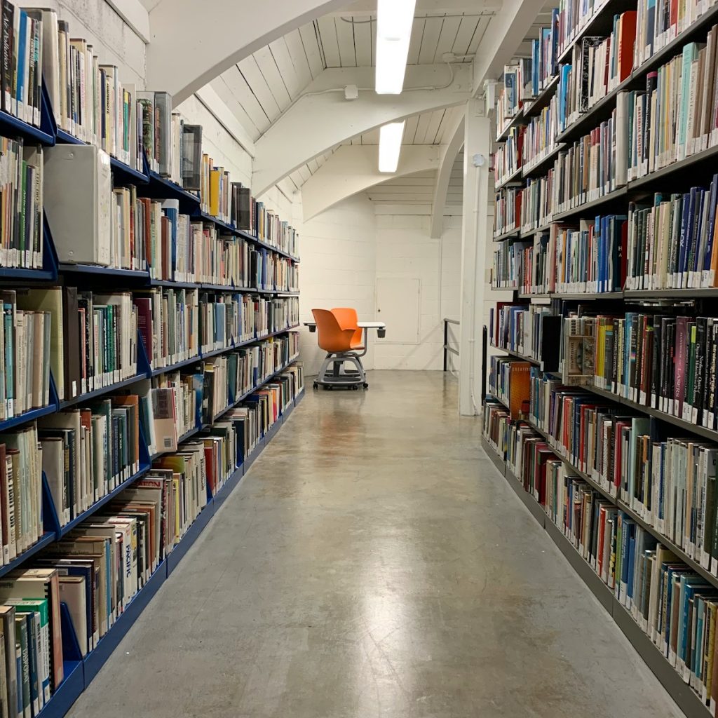 a long row of books in a library